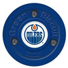 Green Biscuit NHL Team Hockey Puck - HockeyShot